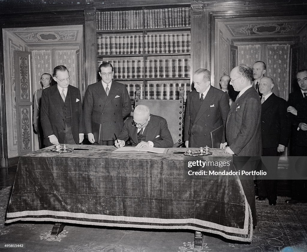 Enrico De Nicola signing the Constitution of the Italian Republic