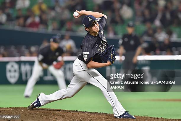 Yudai Ohno of Japan pitches in the bottom half of the sixth inning during the send-off friendly match for WBSC Premier 12 between Japan and Puerto...