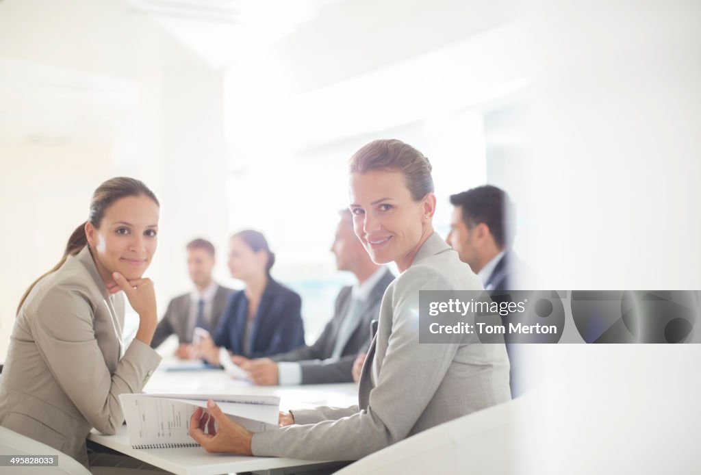 Portrait of confident businesswomen in conference room