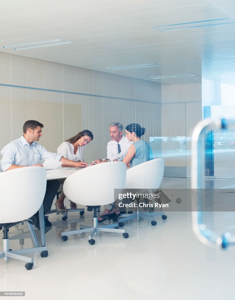 Business people meeting at conference room table