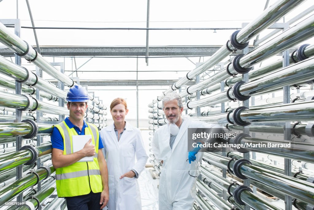 Portrait of confident scientists and engineer in greenhouse