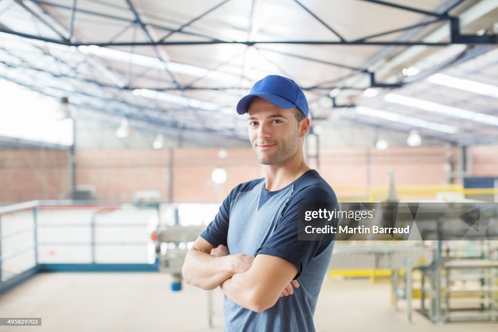 Portrait of confident worker in food processing plant