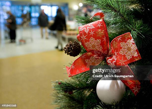 Christmas, Christmas shopping, Christmas decorations. Scene in a department store.