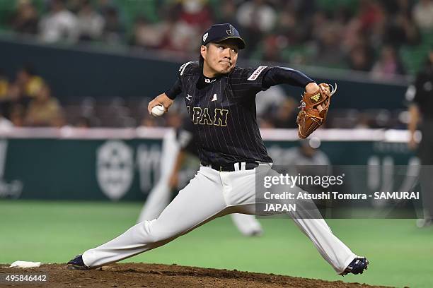 Takahiro Norimoto of Japan pitches in the bottom half of the seventh inning during the send-off friendly match for WBSC Premier 12 between Japan and...