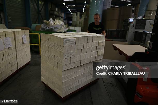 Copies of the 2015 Prix Goncourt, "Boussole" written by Mathias Enard are stored after their printing at "Normandie Roto Impression" printing house...