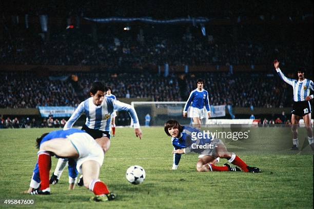 French midfielder Dominique Bathenay vies with Argentinian player during the 1978 World Cup football match between France and Argentina, on June 6,...