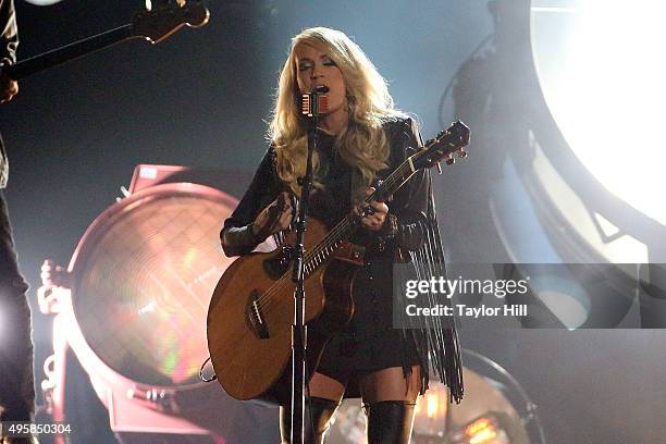 Carrie Underwood performs during the 49th annual CMA Awards at the Bridgestone Arena on November 4, 2015 in Nashville, Tennessee.