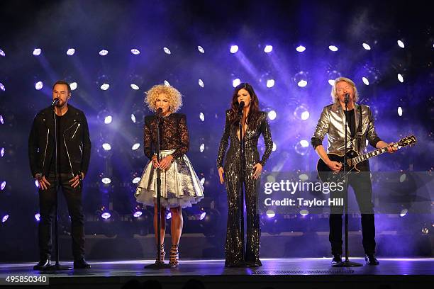 Philip Sweet, Kimberly Schlapman, Karen Fairchild, and Jimi Westbrook of Little Big Town perform during the 49th annual CMA Awards at the Bridgestone...