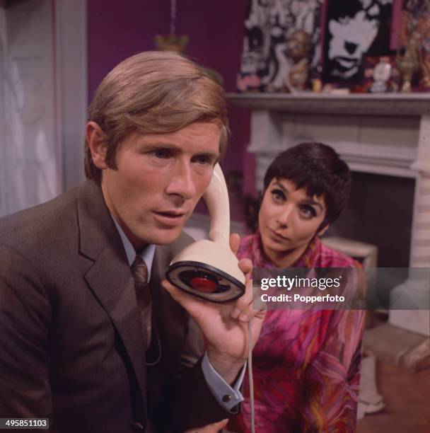 German actor Horst Janson pictured with English actress Jacqueline Pearce in a scene from the television drama 'Root Of All Evil' in 1968.