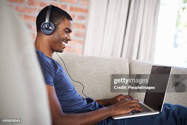 immersed in his studies - toothy smile stock pictures, royalty-free photos & images