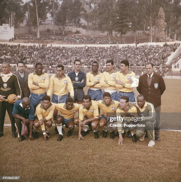 The Brazil International football team including Djalma Santos, Garrincha, Vava, Zozimo, Gilmar, Zito and Mauro line up before a game in 1962.