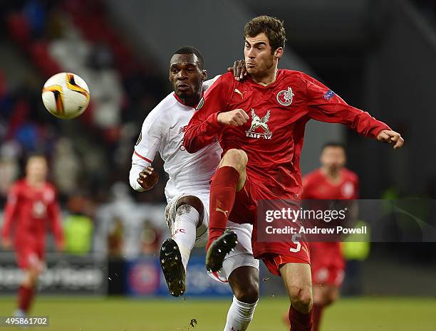 Christian Benteke of Liverpool competes with Solomon Kverkvelia of Rubin Kazan during the UEFA Europa League Group B match between FC Rubin Kazan and...