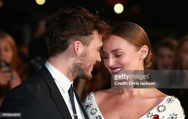 Actor Sam Claflin and Laura Haddock attend "The Hunger Games: Mockingjay Part 2" UK Premiere at the Odeon Leicester Square on November 5, 2015 in...