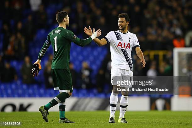 Goalkeeper Hugo Lloris of Spurs and Mousa Dembele of Spurs shake hands following their team's 2-1 victory during the UEFA Europa League Group J match...