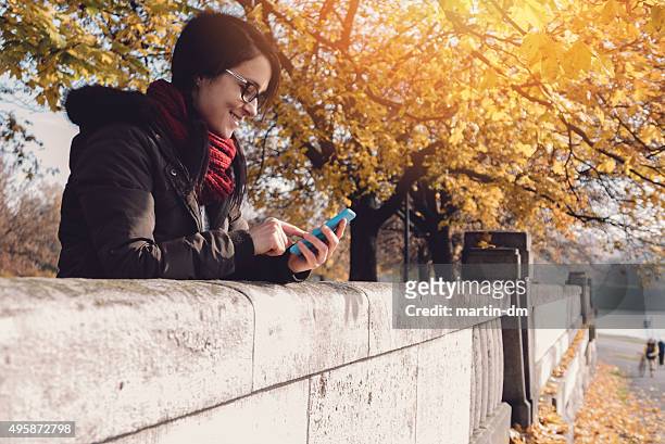 student in the autumn park - krakow park stock pictures, royalty-free photos & images