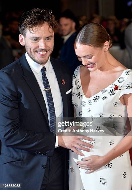 Laura Haddock and Sam Claflin attend The Hunger Games: Mockingjay Part 2 - UK Premiere at Odeon Leicester Square on November 5, 2015 in London,...