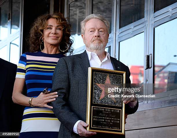 Director Ridley Scott , who was honored with a Hollywood Walk of Fame Star, poses with his wife Giannina Facio November 5 in Hollywood, California.