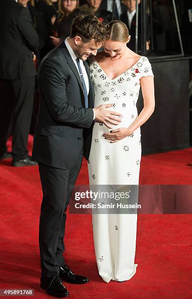 Laura Haddock and Sam Claflin attend The Hunger Games: Mockingjay Part 2 - UK Premiere at Odeon Leicester Square on November 5, 2015 in London,...