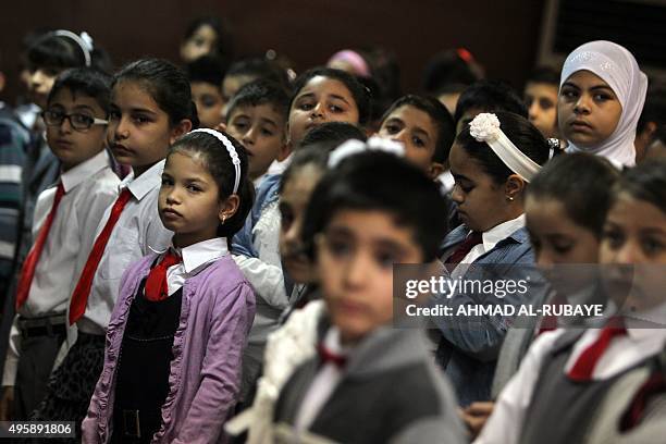 Iraqi children attend a class on October 26, 2015 at the Mariamana school in the multi-ethnic northern Iraqi city of Kirkuk where Kurdish, Arab and...