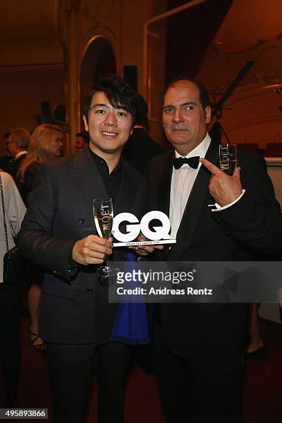 Lang Lang and Jose Redondo-Vega pose at the GQ Men of the year Award 2015 after show party at Komische Oper on November 5, 2015 in Berlin, Germany.