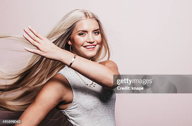 beautiful woman with long pretty hair - long blonde hair stock pictures, royalty-free photos & images