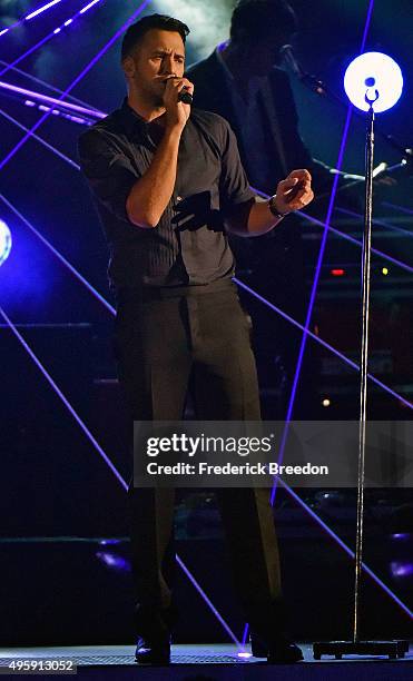 Luke Bryan performs the song ÒStrip It Down at the 49th annual CMA Awards at the Bridgestone Arena on November 4, 2015 in Nashville, Tennessee.