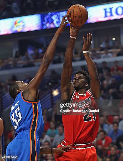 Kevin Durant of the Oklahoma City Thunder blocks a shot by Jimmy Butler of the Chicago Bulls at the United Center on November 5, 2015 in Chicago,...