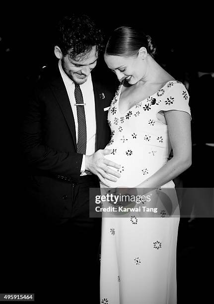 Sam Claflin and Laura Haddock attend The Hunger Games: Mockingjay Part 2 - UK Premiere at Odeon Leicester Square on November 5, 2015 in London,...