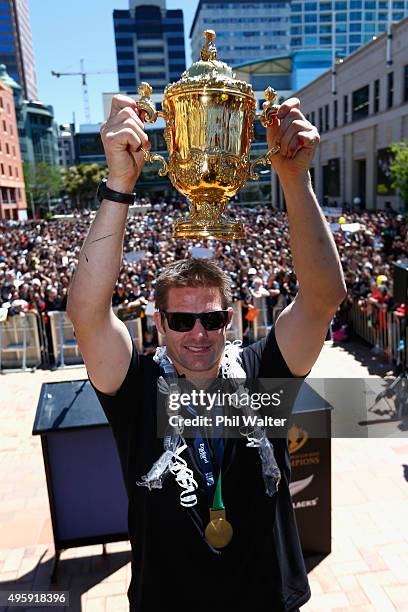 All Black captain Richie McCaw holds up the Webb Ellis Cup during the New Zealand All Blacks Welcome Home celebration in Civic Square on November 6,...