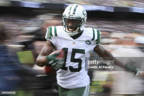Wide Receiver Brandon Marshall of the New York Jets has a big gain against the Oakland Raiders at O.co Coliseum on November 1, 2015 in Oakland,...