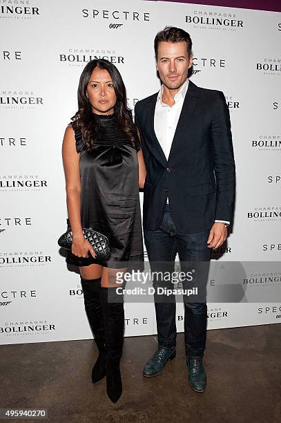 Keytt Lundqvist and Alex Lundqvist attend the "Spectre" pre-release screening hosted by Champagne Bollinger and The Cinema Society at IFC Center on...