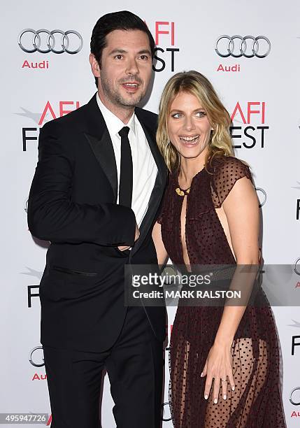 Actor Melvil Poupaud and actress Melanie Laurent arrive for the opening night gala premiere of Universal Pictures' 'By the Sea' during AFI FEST 2015...