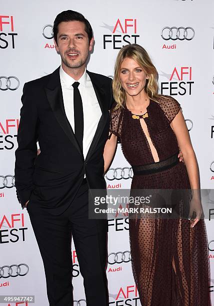 Actor Melvil Poupaud and actress Melanie Laurent arrive for the opening night gala premiere of Universal Pictures' 'By the Sea' during AFI FEST 2015...