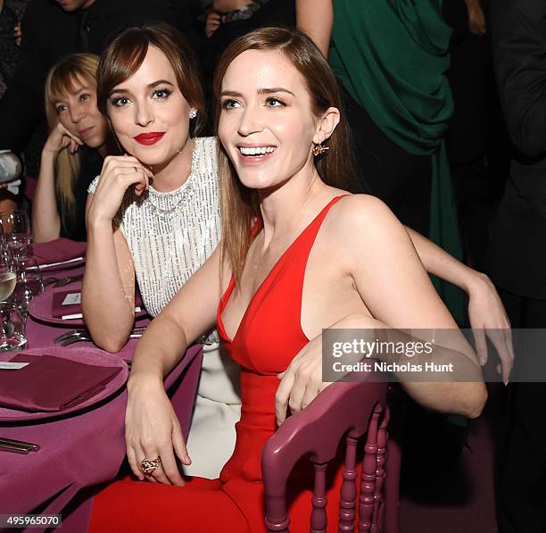 Dakota Johnson and Emily Blunt attend the 2015 Guggenheim International Gala Dinner made possible by Dior at Solomon R. Guggenheim Museum on November...