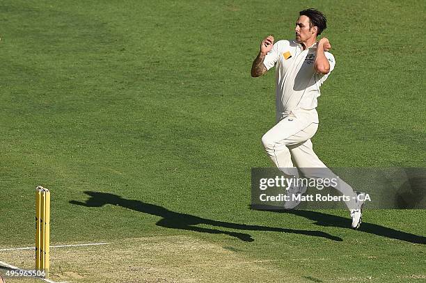 Mitchell Johnson of Australia bowls during day two of the First Test match between Australia and New Zealand at The Gabba on November 6, 2015 in...