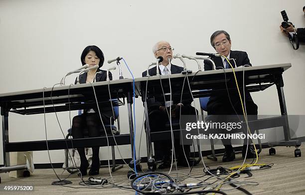 Japanese airbag supplier Takata Corp. Chief Financial Officer Yoichiro Nomura and company employees hold a press briefing to announce the company's...