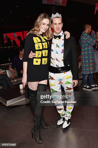 Jamie Clayton and designger Jeremy Scott attend Jeremy Scott For Longchamp 10th Anniversary held at a Private Residence on November 5, 2015 in...