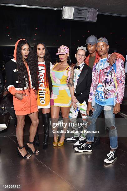 Model Amber Rose and designer Jeremy Scott attend Jeremy Scott For Longchamp 10th Anniversary held at a Private Residence on November 5, 2015 in...