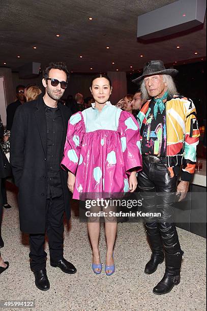 Artist Alex Israel, actress China Chow and James Goldstein attend Jeremy Scott For Longchamp 10th Anniversary held at a Private Residence on November...