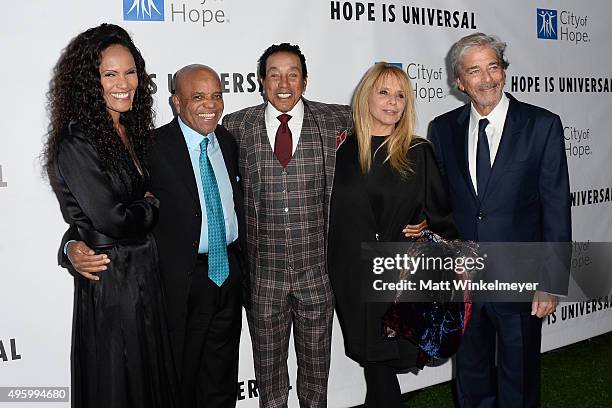 Eskedar Gobeze, record producer Berry Gordy, singer/songwrites Smokey Robinson, actress Rosanna Arquette, and Todd Morgan arrive at the City of...