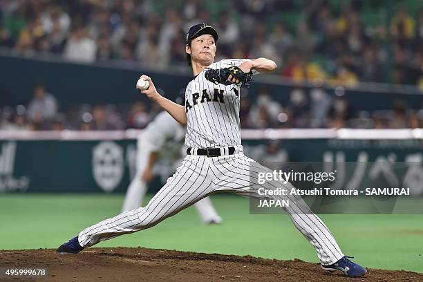 Shota Takeda of Japan pitches in the top half of the fourth inning during the send-off friendly match for WBSC Premier 12 between Japan and Puerto...