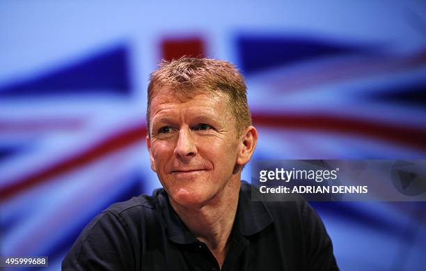 British astronaut Tim Peake looks on during a press conference at the Science Museum in London on November 6, 2015. Peake is set to embark on a...