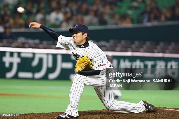 Yuki Nishi of Japan pitches in the top half of the third inning during the send-off friendly match for WBSC Premier 12 between Japan and Puerto Rico...