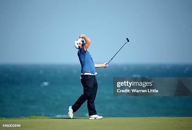 Max Orrin of England reacts to a missed putt on the 13th green during the third round of the NBO Golf Classic Grand Final at the Almouj Golf Club,...