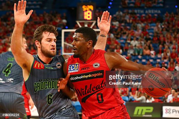 Jermaine Beal of the Wildcats goes to the basket against Mitchell Norton of the Crocodiles during the round five NBL match between Perth Wildcats and...