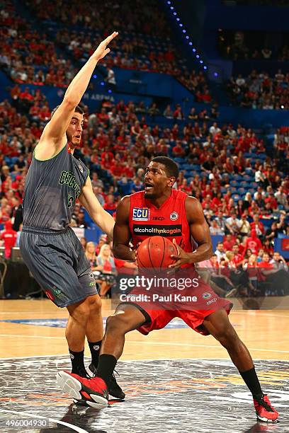 Jermaine Beal of the Wildcats works to the basket against Mirko Djeric of the Crocodiles during the round five NBL match between Perth Wildcats and...