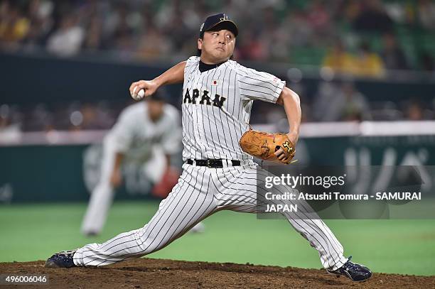 Hirokazu Sawamura of Japan pitches in the top half of the eighth inning during the send-off friendly match for WBSC Premier 12 between Japan and...