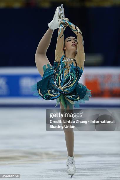 Rika Hongo of Japan perform during the Ladies Short Program on day one of Audi Cup of China ISU Grand Prix of Figure Skating 2015 at Beijing Capital...