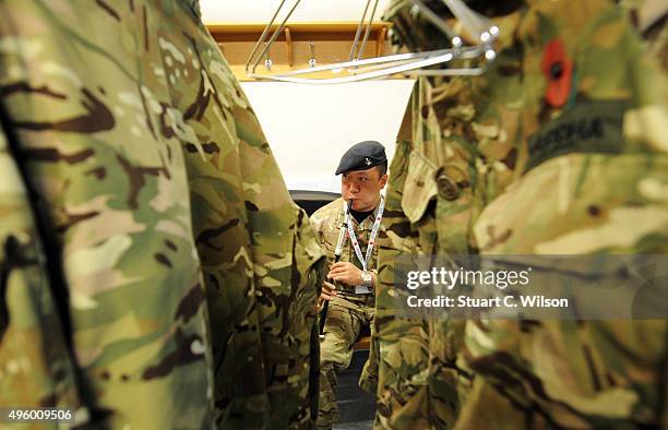 Members of The Band of the Brigade of Gurkhas preparing for their rehearsal for The Royal British Legion's Festival of Remembrance at the Royal...