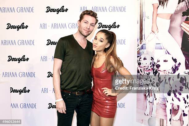 Ferry Hansen, Beauty Director for Men's Health/Women's Health in Germany and Ariana Grande attend the Exclusive Meet & Greet With Ariana Grande At...